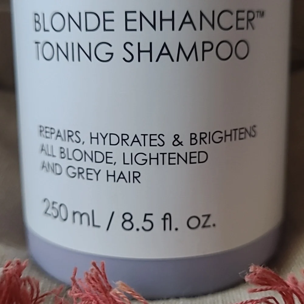 Olaplex No.4P Blonde Enhancer Toning Shampoo.